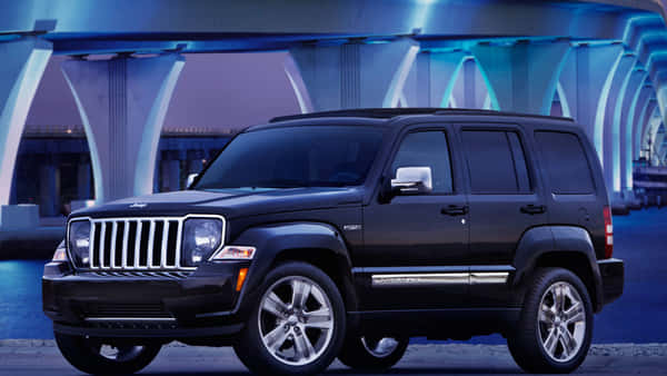 Download Captivating Jeep Liberty Off-roading Adventure Wallpaper