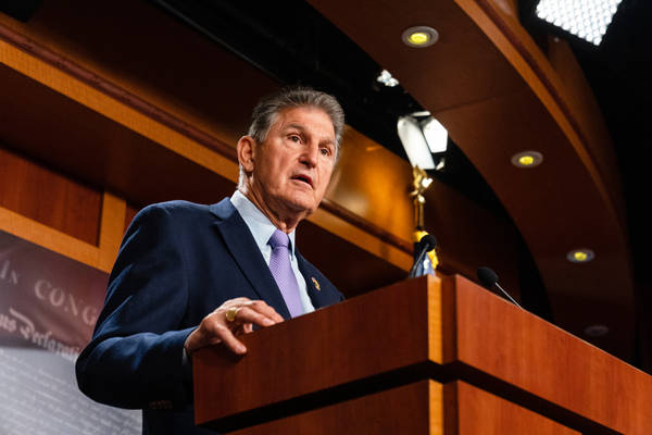 Download Cross-armed Joe Manchin Wallpaper | Wallpapers.com