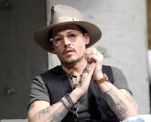 Download Johnny Depp - Hollywood Superstar | Wallpapers.com