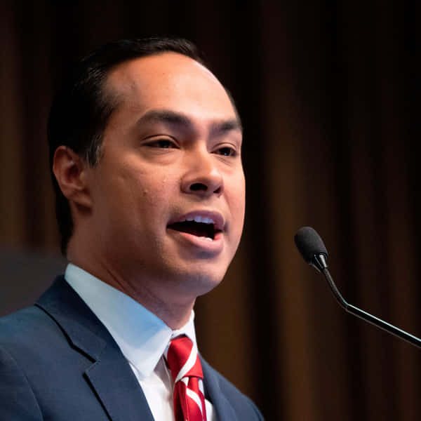 Download Julian Castro In White Outfit Wallpaper | Wallpapers.com