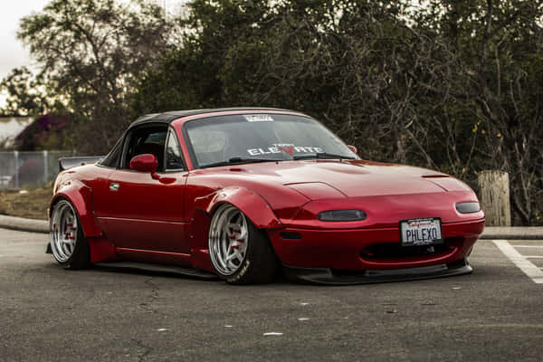 Download Black Classic Mazda Mx 5 Miata Wide Angle Shot Wallpaper ...