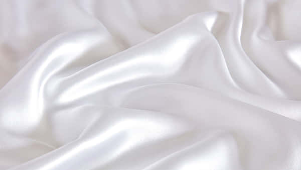 Download A Crumpled White Silk Background | Wallpapers.com