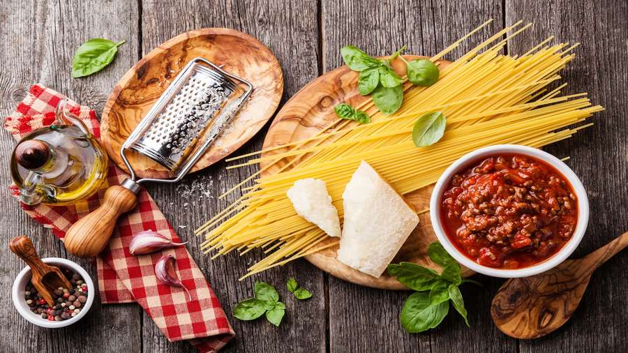 Fresh pasta basil oil cheese and sauce on wooden boards for Italian cooking. — 1920x1080 Pasta Background