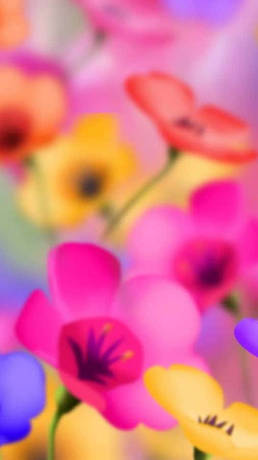 Flores suaves borrosas en rosa, amarillo y azul crean un fondo abstracto colorido y soñador. — 540x960 Fondos de pantalla