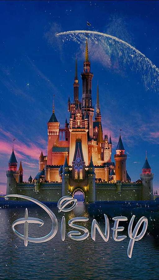 Disney castle glowing at night with magical sparkles in the sky. — 720p Disney Background