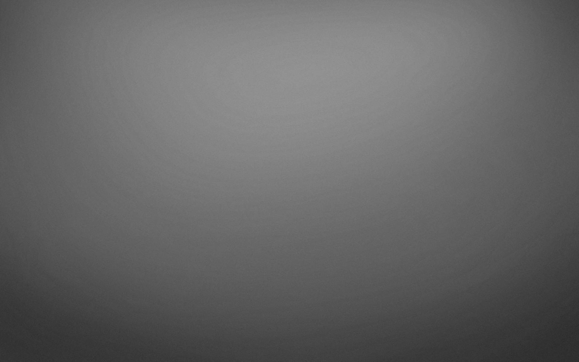 Latar belakang gradien abu-abu halus dengan variasi tonal halus. — Abu Solid Wallpaper