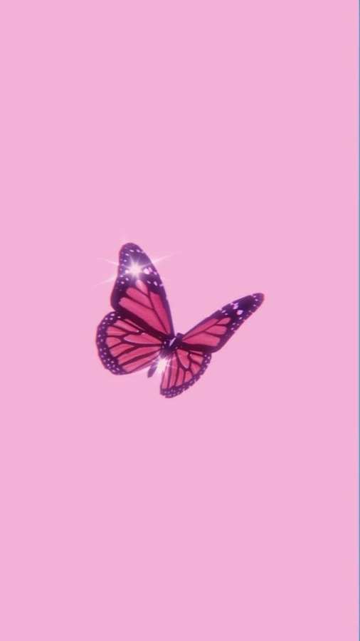 A pink and purple butterfly with sparkles flying against a pastel pink background. — Aesthetic Girly Wallpaper