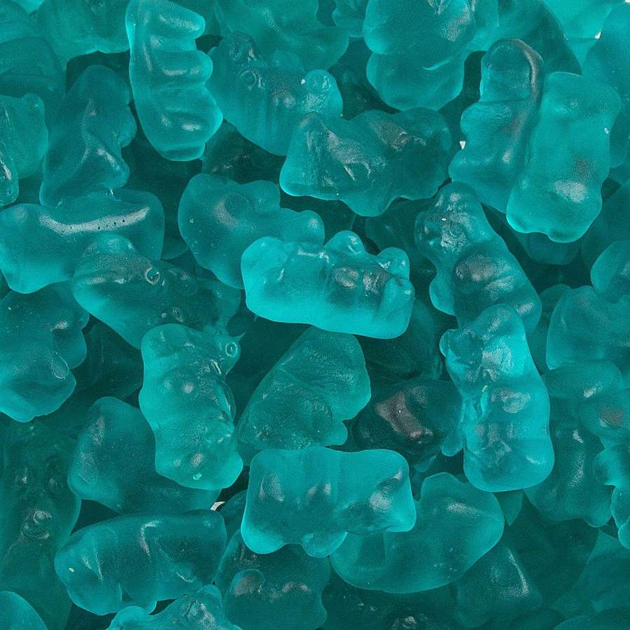 A pile of translucent teal gummy bears with glossy surfaces. — Aesthetic Teal Background
