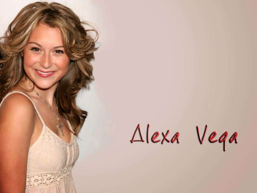 Alexa Vega smiling in a cream lace top with her name in red script. — Alexa Penavega Wallpaper