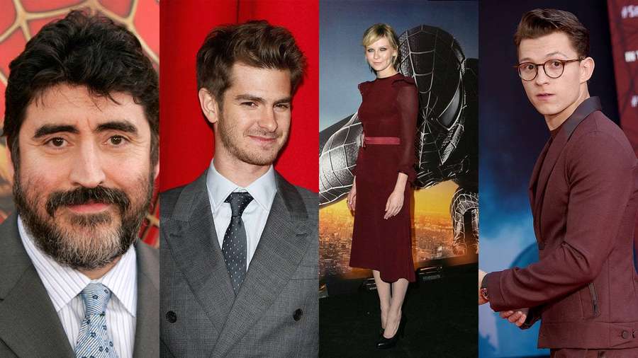 Four actors in suits at a movie premiere with superhero backdrops. — Alfred Molina Background