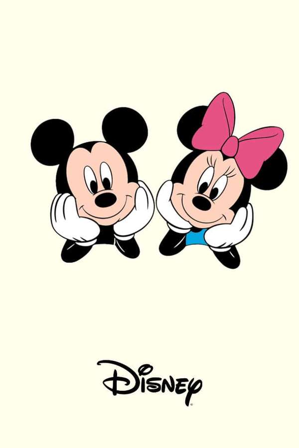 Mickey y Minnie Mouse sonriendo con las manos debajo de la barbilla sobre fondo crema. — Amarillo pastel Fondos de pantalla