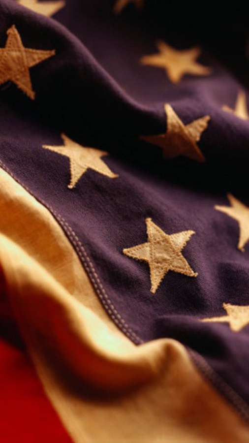 Närbild av amerikanska flaggstjärnor och ränder med texturerat tyg. — American Flag Cool iPhone Bakgrundsbilder