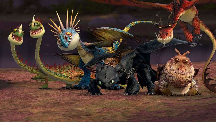 Un grupo de dragones animados con escamas coloridas y rostros expresivos. — Animado Fondos de pantalla