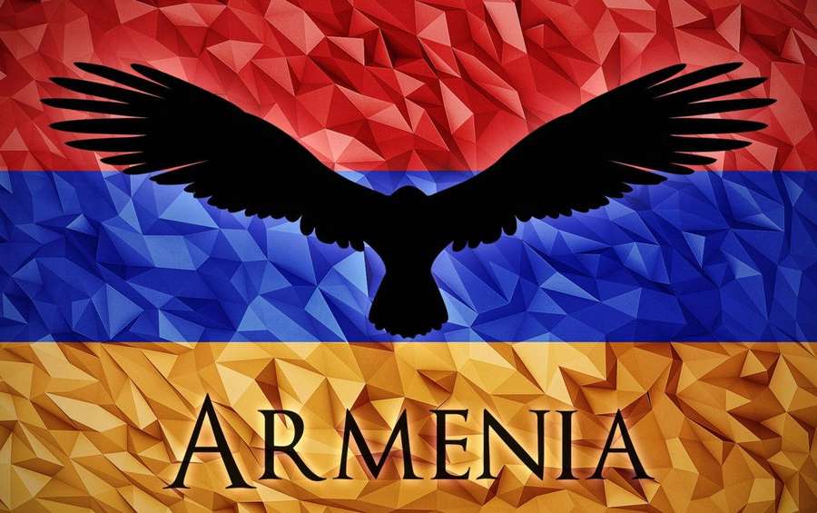 Black eagle silhouette against Armenia's red blue and gold geometric flag with text. — Armenia Wallpaper