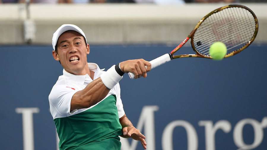 Tennis player hitting a ball during a match. — Arthur Ashe Background