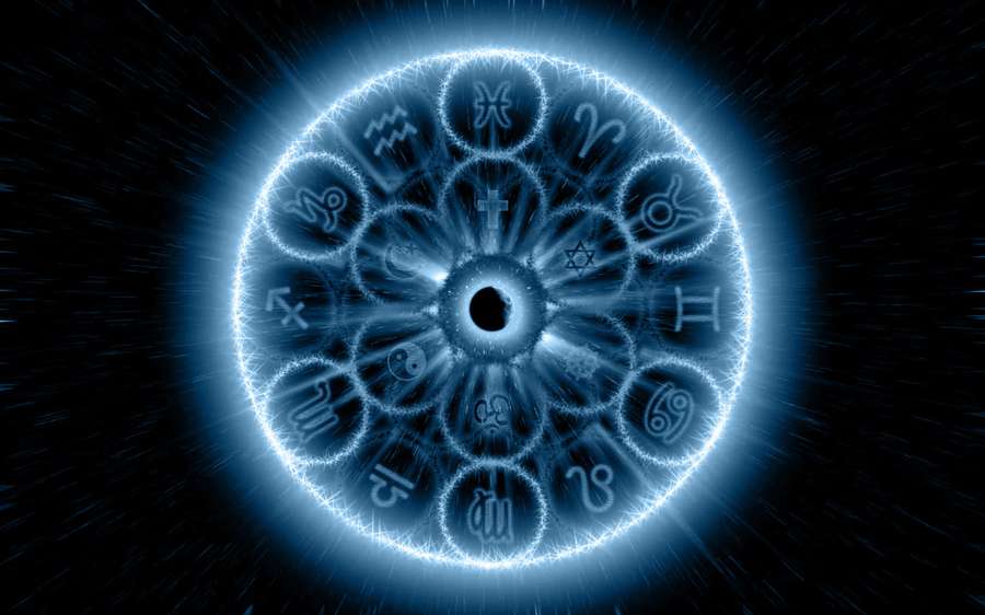 A glowing blue zodiac wheel with cosmic symbols against a dark starry background. — Astrology Background