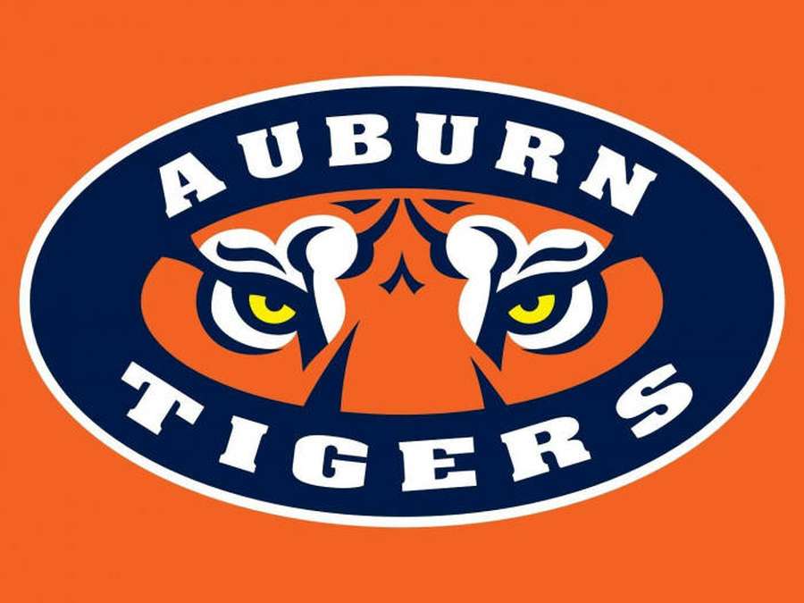 Auburn Tigers Sportlogo mit Tigeraugen und Text in Orange, Blau und Weiß. — Auburn Bilder