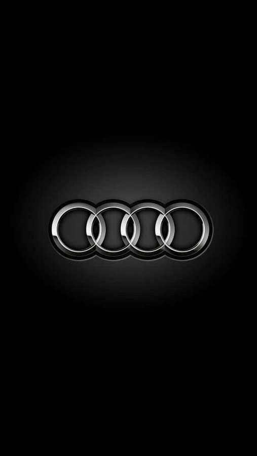 Audi logo with chrome rings on black gradient background — Audi iPhone Wallpaper