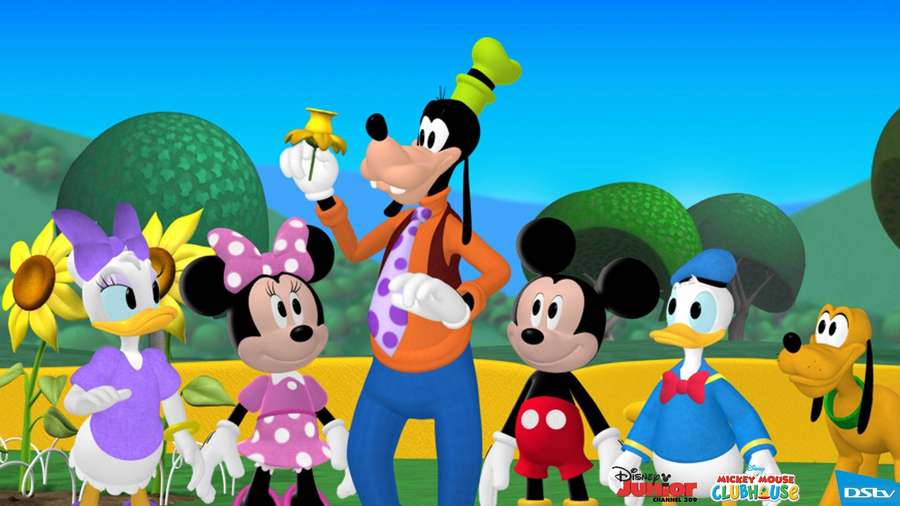 Disney-hahmot Hessu, Mikki, Minni, Iines, Aku ja Pluto aurinkoisella niityllä auringonkukkien kanssa. — Auringonkukka Taustakuvat