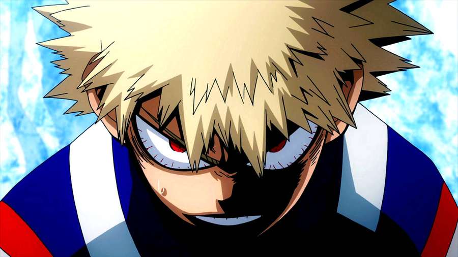Anime character with spiky blonde hair and red eyes wearing a blue white and red uniform. — Bakugo Wallpaper