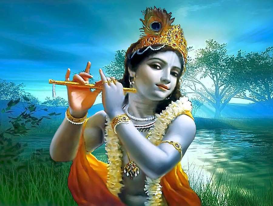 Divine figure playing flute by river with blue skin and golden crown — Beautiful Krishna Wallpaper