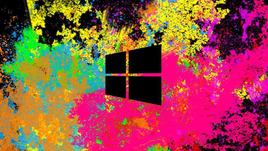 Windows logo surrounded by explosive neon paint splatters and black grunge texture. — Best Laptop Background