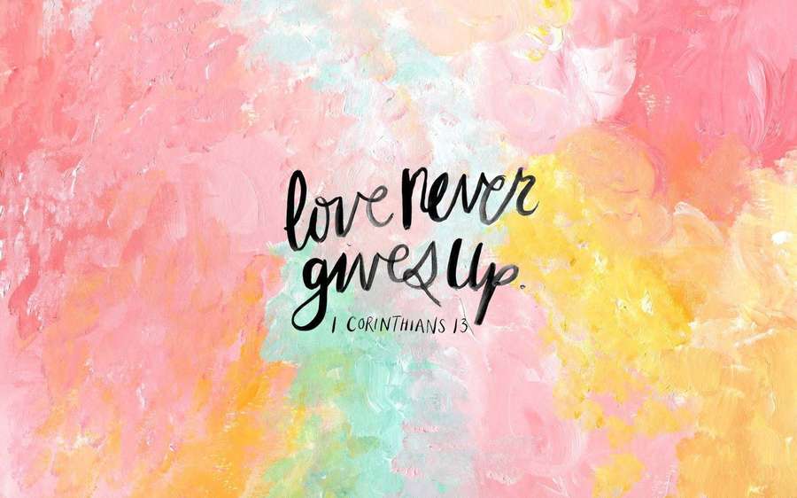 Abstract watercolor background with inspirational quote love never gives up. — Bible Verse Aesthetic Background