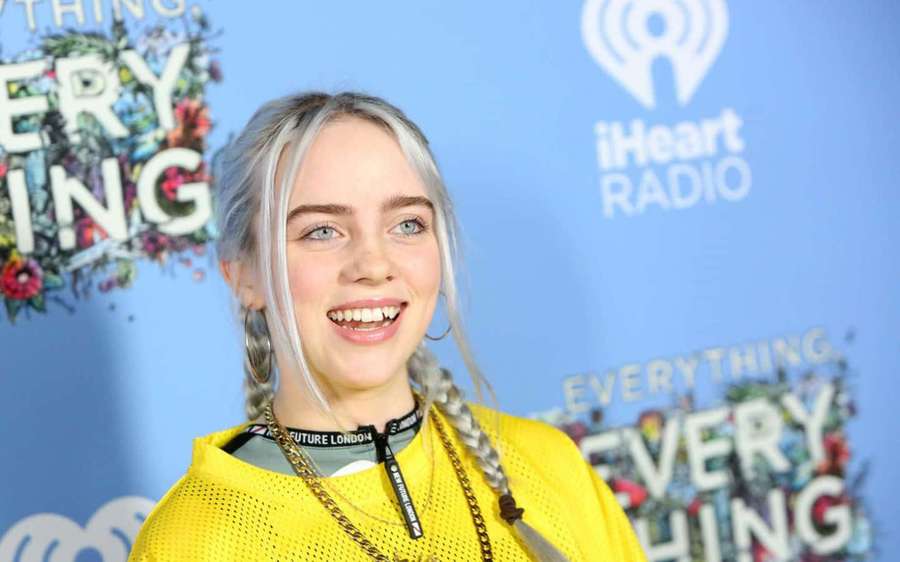 Follow your dreams and always wear a smile! — Billie Eilish Smile Wallpaper
