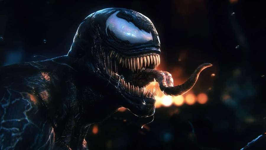 Venom with glowing eyes and sharp teeth in a dark fiery scene. — Black Venom Wallpaper