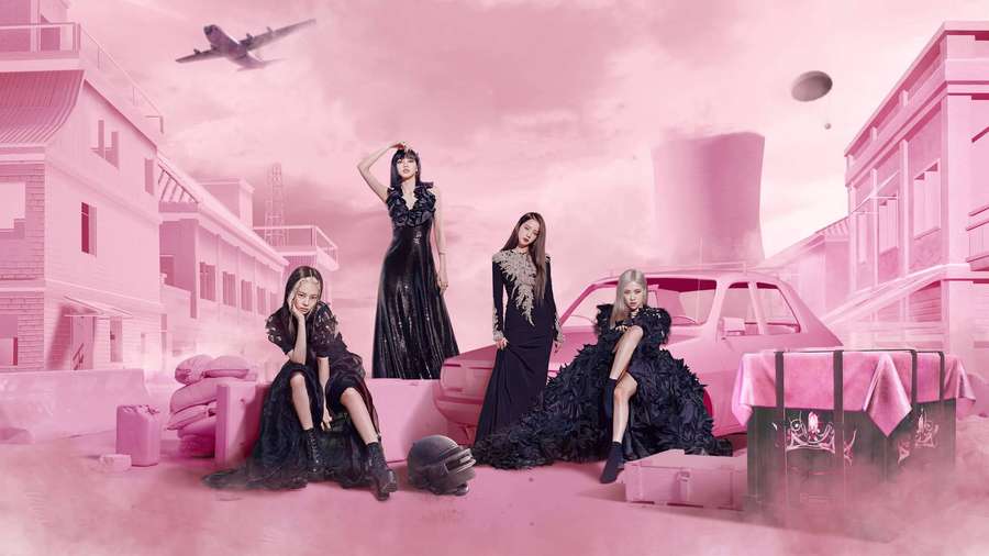 Four stylish women in black dresses pose in a pink-toned urban scene with cars and planes. — Blackpink Desktop Wallpaper