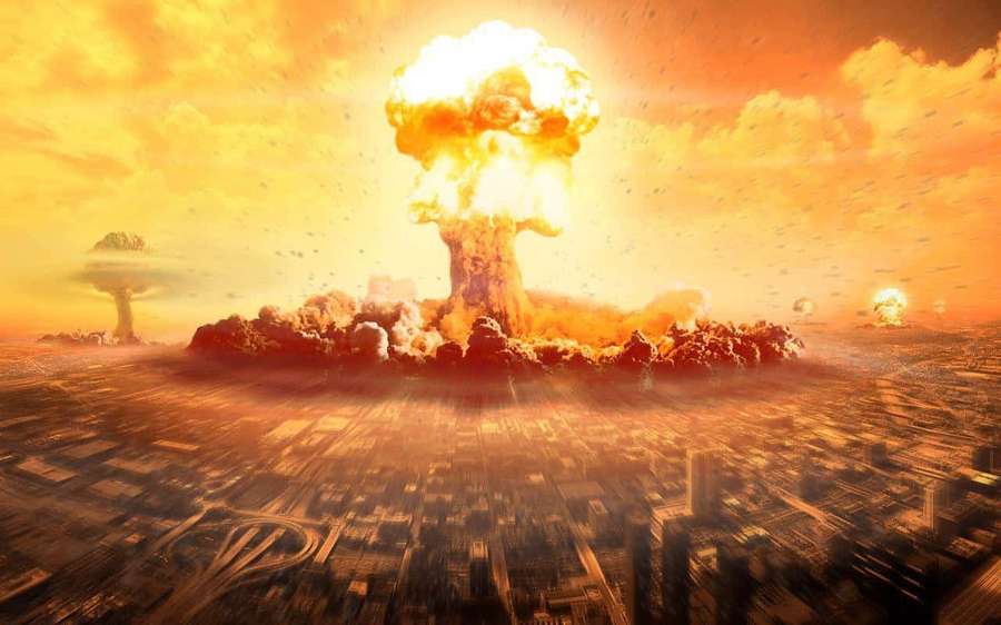 Nuclear explosion over a city with orange sky and mushroom clouds. — Blast Background