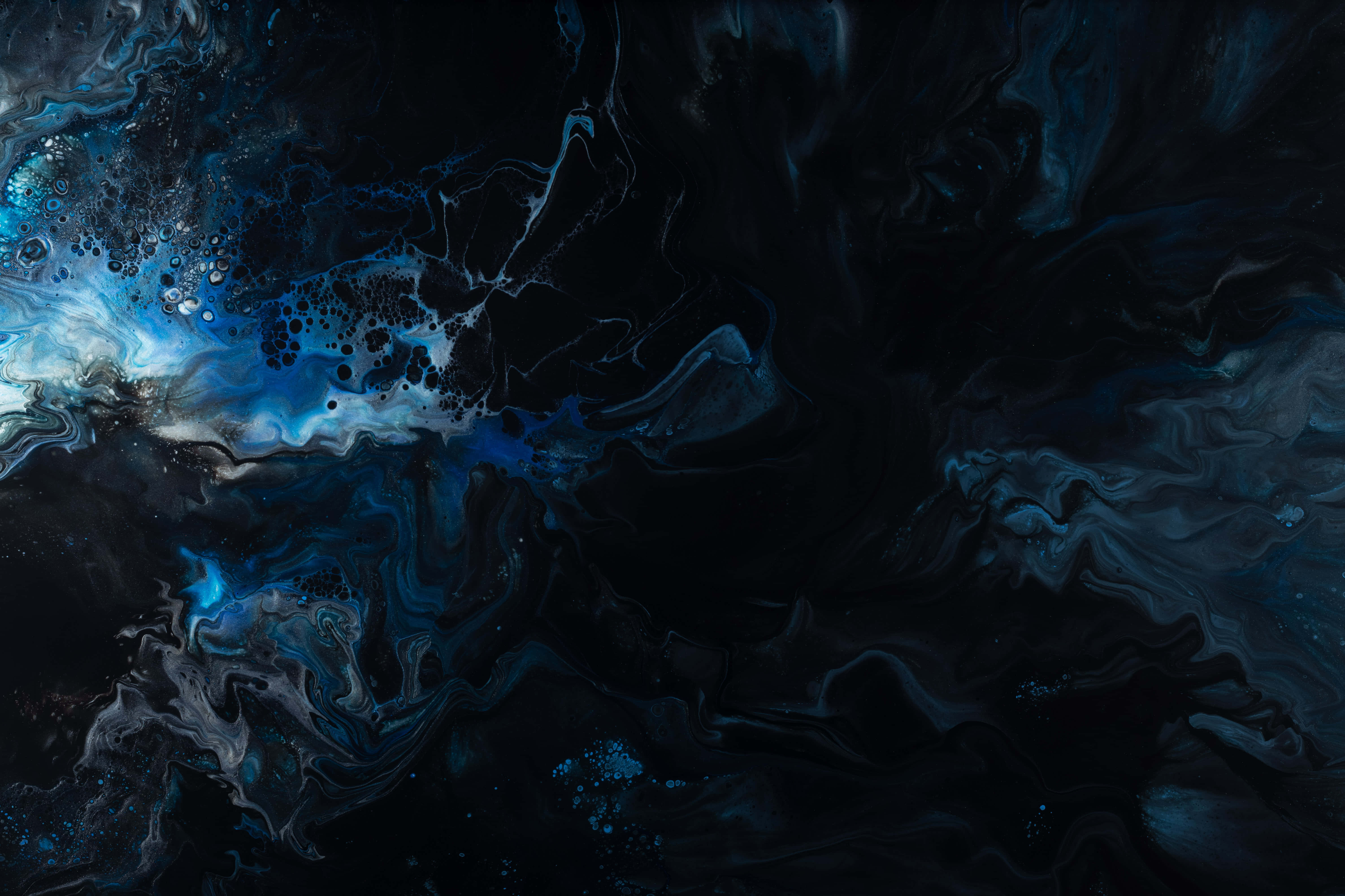 Abstract fluid art with deep blue and black swirls and white accents. — Blue Abstract Wallpaper