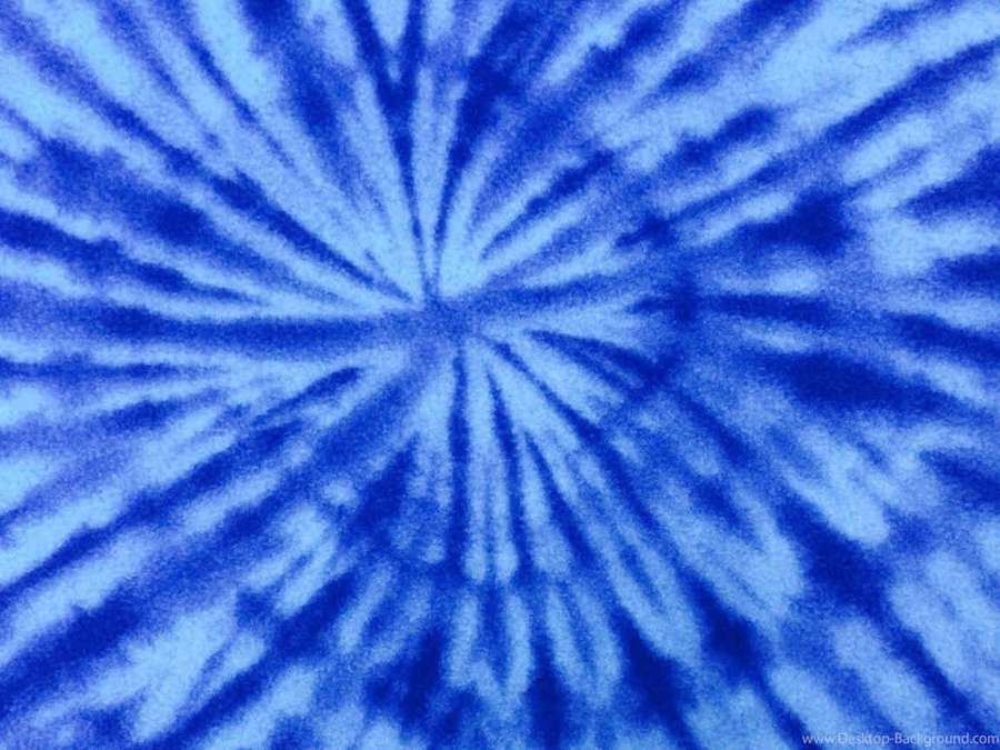 Blue tie-dye fabric with swirling radial patterns. — Blue Tie Dye Background
