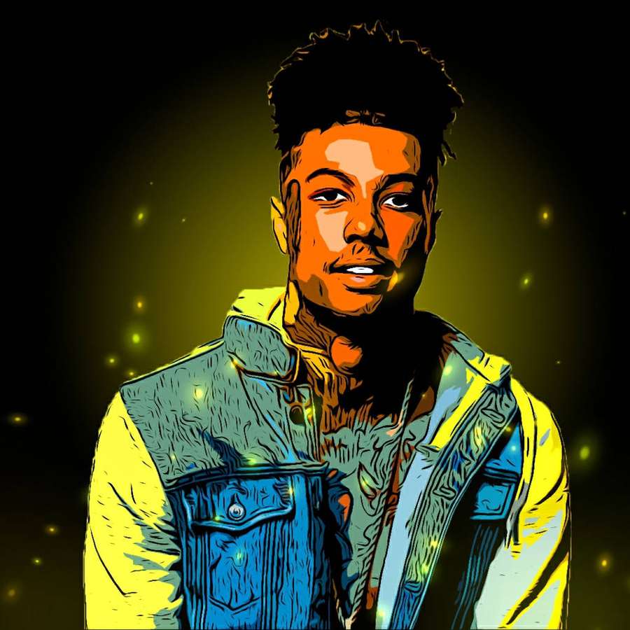 A young man in a denim vest under glowing yellow lights. — Blueface Background