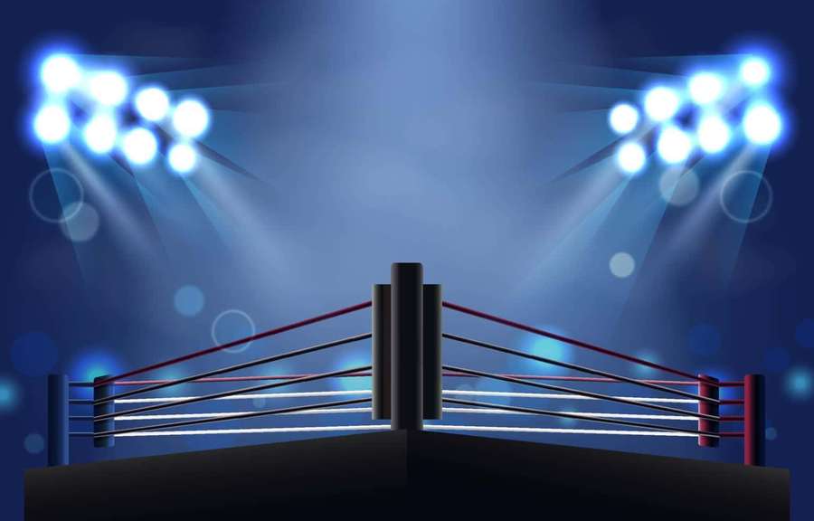 Boxing ring under bright stage lights with bokeh background. — Boxing Ring Background