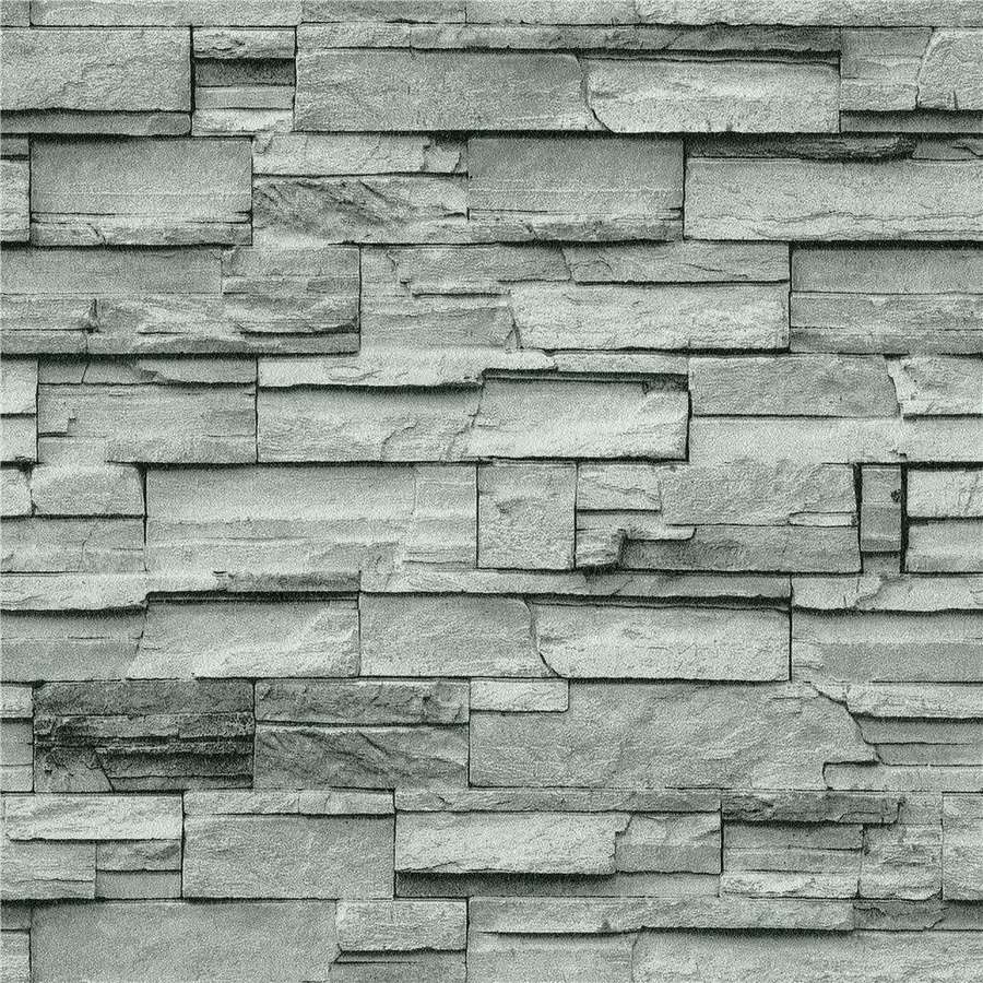 Graue Steinmauer mit geschichteten Schieferplatten für die Innenarchitektur. — Brick Texture Hintergrundbild
