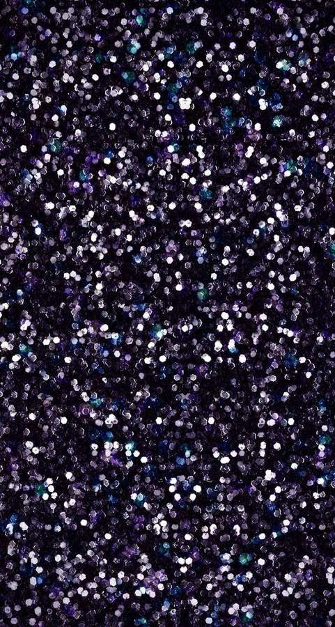 Fondo oscuro cubierto de partículas de purpurina púrpura, plateada y azul brillantes. — Brillo Negro Fondos de pantalla