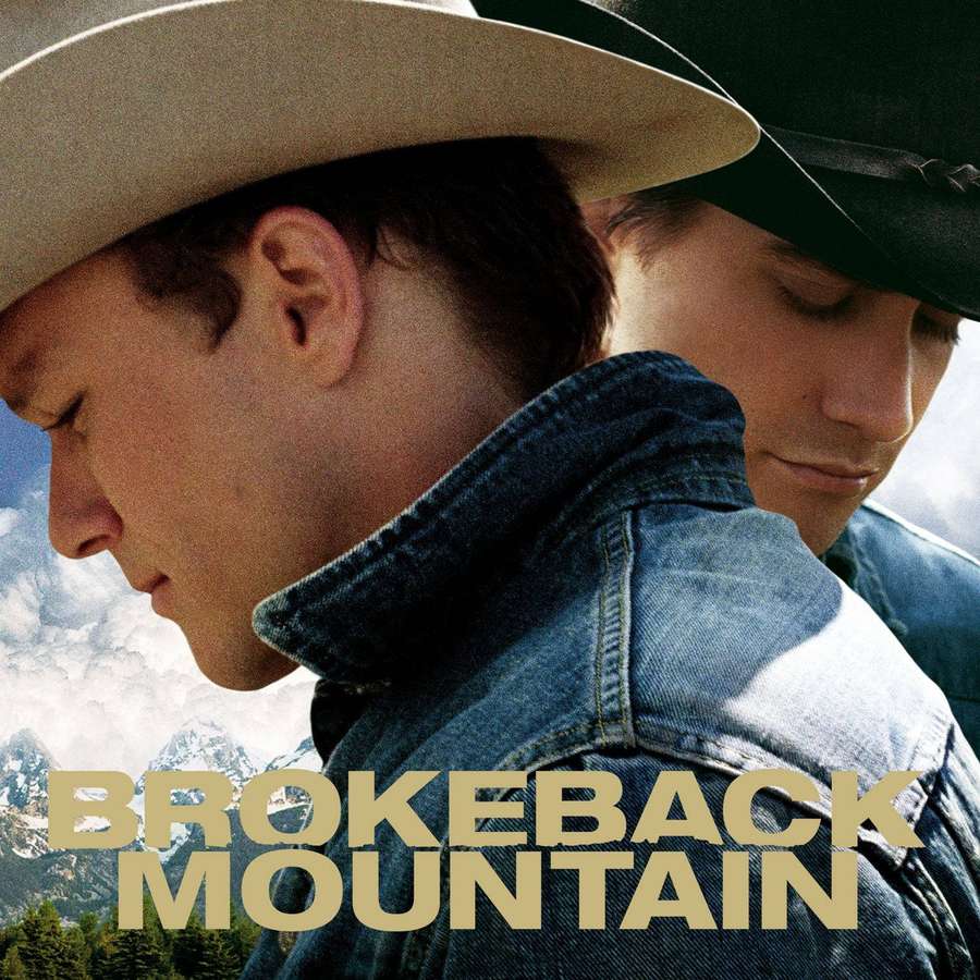Two men in cowboy hats and denim jackets with snowy mountains behind them. — Brokeback mountain Wallpaper