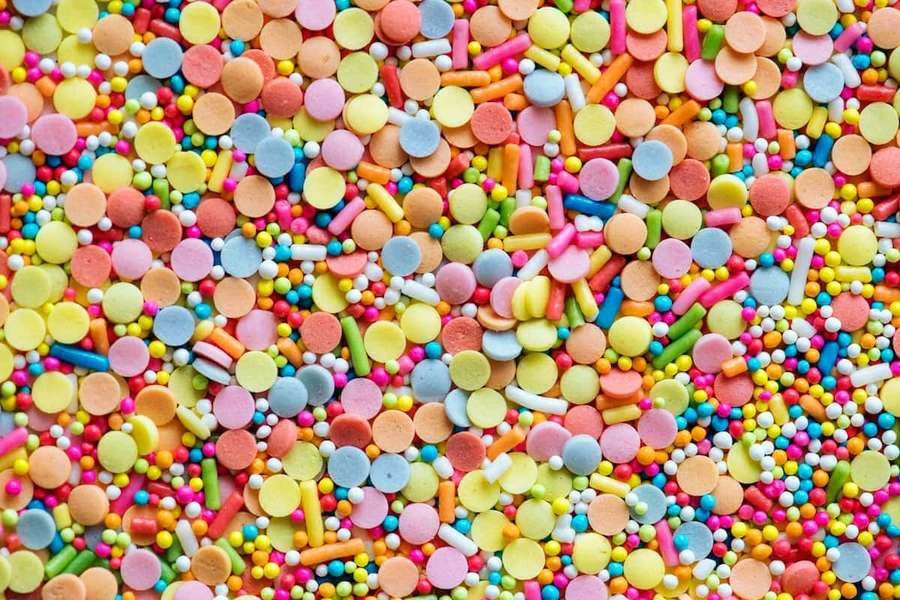 A colorful mix of candy sprinkles for decorating desserts. — Candy Picture