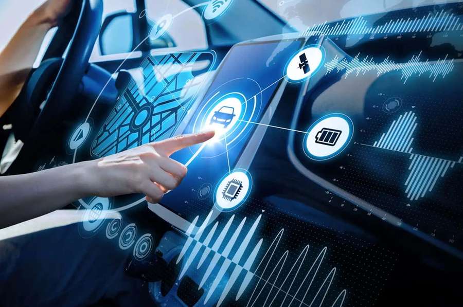 Hand touching a glowing blue holographic car dashboard interface. — Car Technology Wallpaper