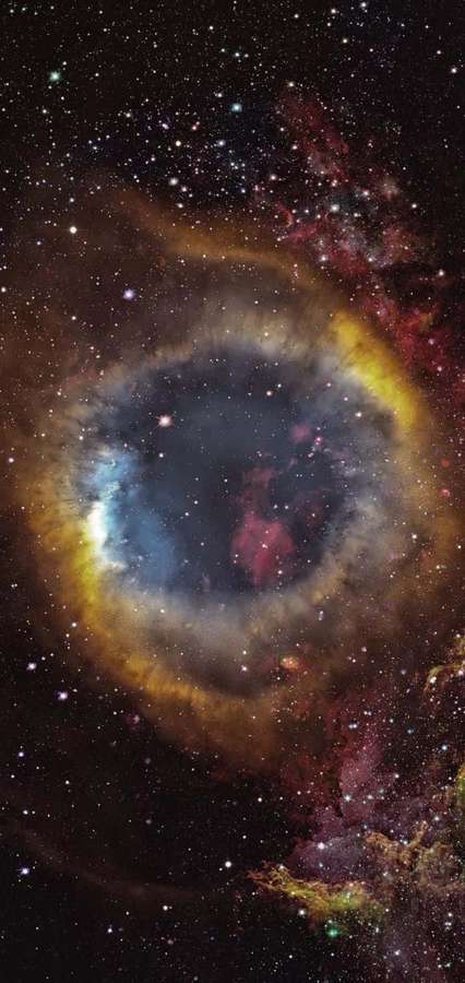 Una nebulosa ocular cósmica brillante con tonos naranja ardiente y azul profundo en el espacio. — Centro Galáctico Fondos de pantalla