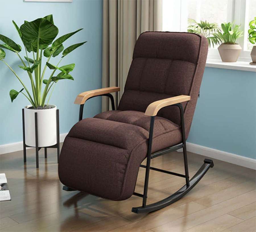 Brown rocking chair with wooden arms in a modern living room with plants. — Chair Picture