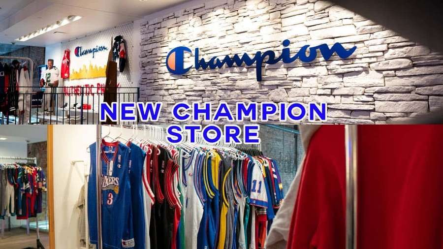 Champion sports store interior with jerseys on display and stone wall branding. — Champion Picture