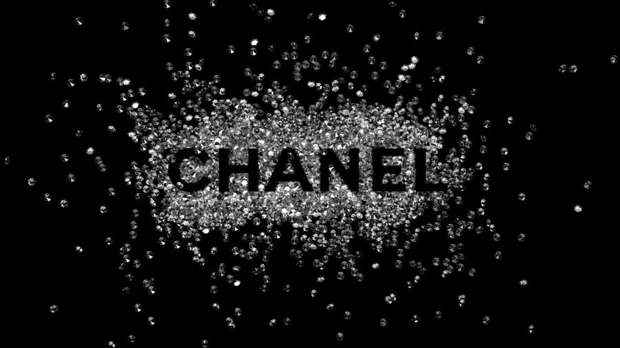Chanel logo formed by falling diamonds on black background — Chanel Background