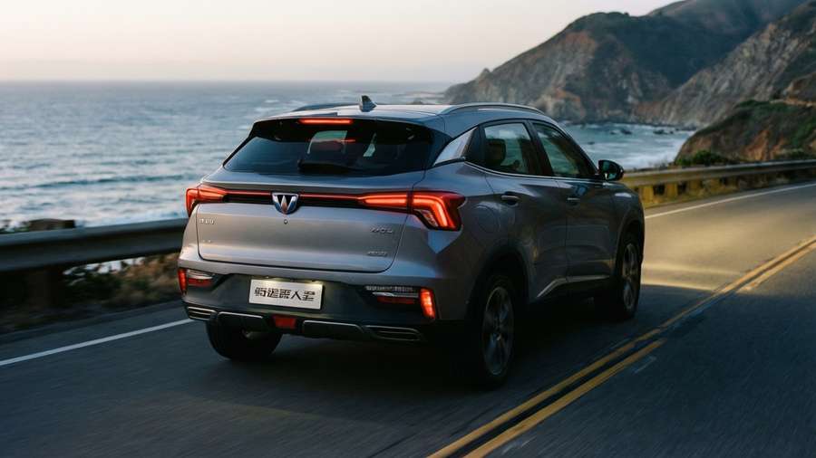 Changan Uni-T along a scenic coastal road at dusk. — Changan Uni-t Wallpaper