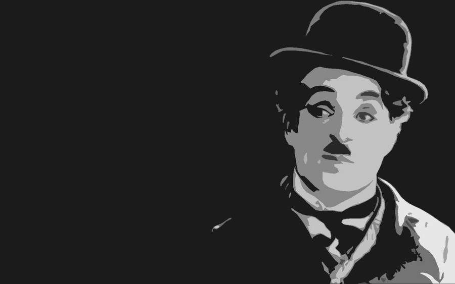 Charlie Chaplin mit Bowlerhut und Schnurrbart in Schwarz-Weiß-Porträt. — Chaplin Bilder