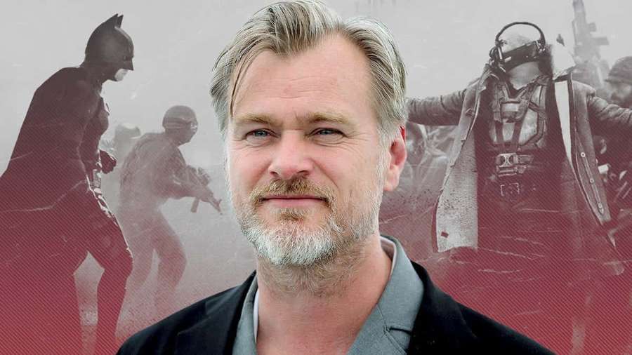 Christopher Nolan with superhero characters in background — Christopher Nolan Wallpaper