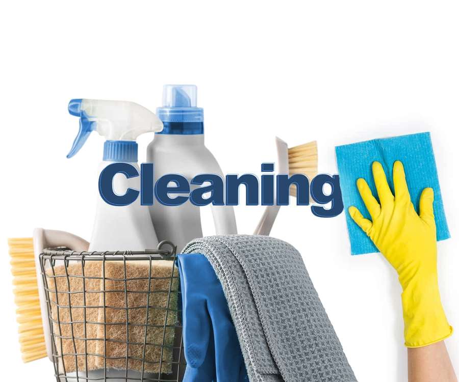 Hand in yellow glove wiping with blue sponge next to cleaning tools. — Cleaning Picture