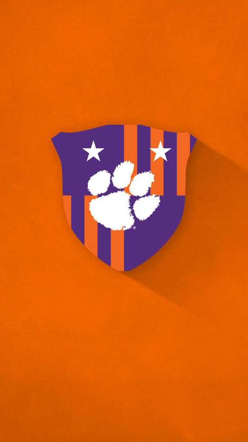 Escudo del logotipo deportivo Clemson Tigers con huella de pata y estrellas sobre fondo naranja — Clemson iPhone Fondos de pantalla