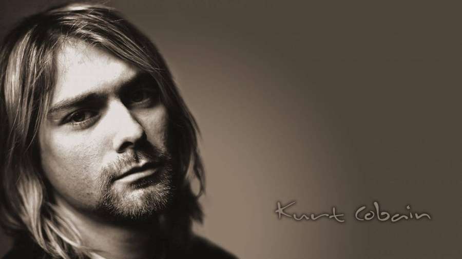 Porträt von Kurt Cobain mit langen Haaren und Bart in Sepiatönen. — Cobain Wallpaper